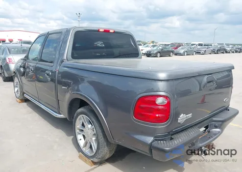 2002 Ford F-150 Lariat from USA, damaged, VIN 1FTRW07322KC24433